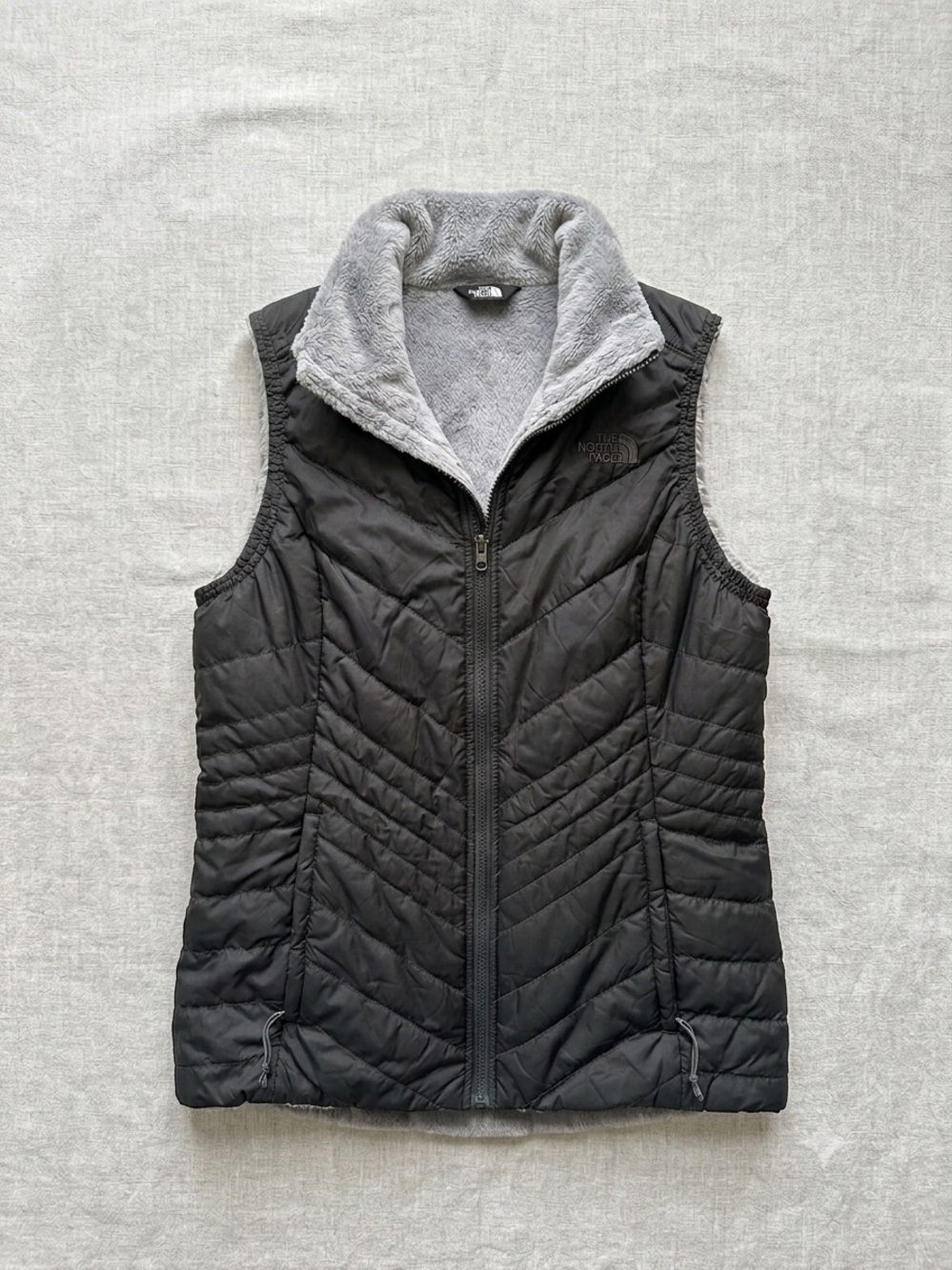 The North Face Black Quilted Vest with Light Gray Fleece Collar